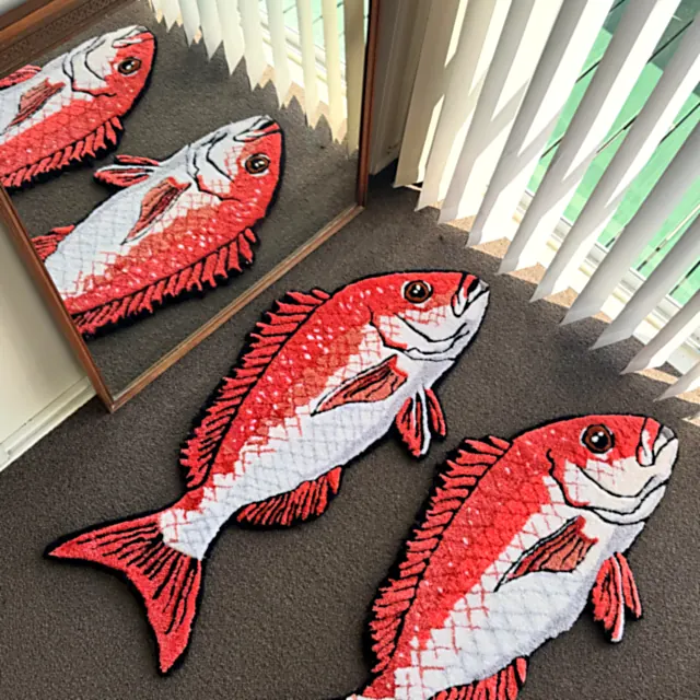 Red snappers, a hand-tufted rug by Rez Rug Studio